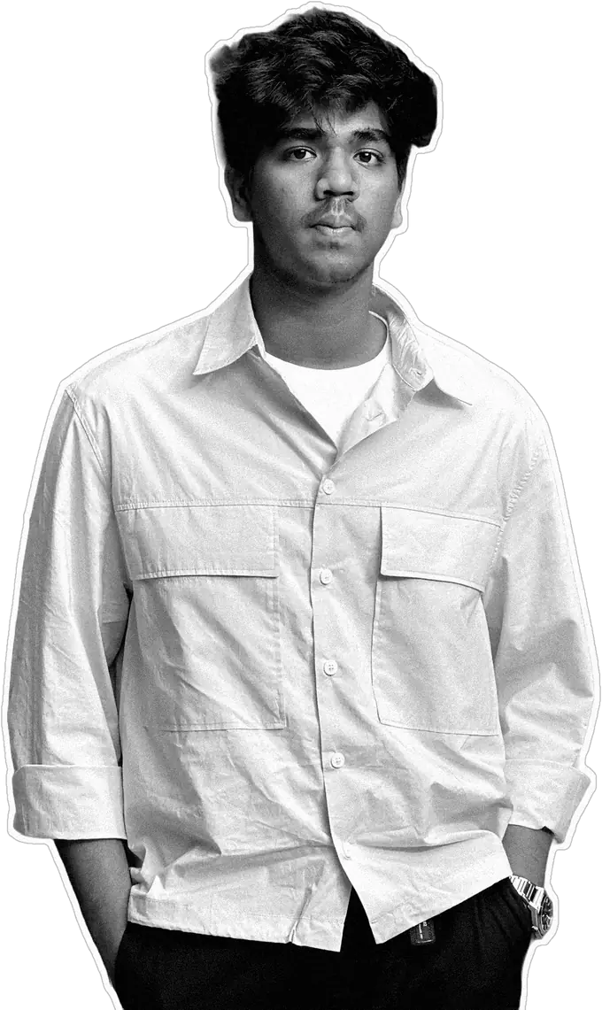 Kodi Alex in a light shirt, hands in pockets